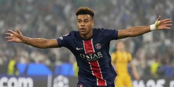 Penyerang PSG, Desire Doue merayakan gol ke gawang Inter Milan di final Liga Champions di Allianz Arena, 1 Juni 2025. (c) AP Photo/Matthias Schrader