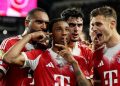 Michael Olise (tengah) merayakan gol kedua Bayern. Foto: FC Bayern via Getty Images/S. Mellar