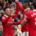 Jadon Sancho, Marcus Rashford, dan Bruno Fernandes melakukan selebrasi setelah merobek gawang Leicester City dalam lanjutan Liga Inggris 2022/2023 di Old Trafford, Minggu (19/2/2023) malam WIB. (AP Photo/Dave Thompson)