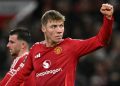 Penyerang Manchester United, Rasmus Hojlund, mendapatkan godaan dari AC Milan usai menegaskan ingin bertahan di Old Trafford. (Photo by Oli SCARFF / AFP)(AFP/OLI SCARFF)