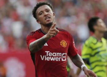 Pemain Manchester United Jadon Sancho berselebrasi setelah mencetak gol ke gawang Arsenal dalam pertandingan pramusim di MetLife Stadium, New Jersey, Amerika Serikat, Minggu (23/7/2023). (Leonardo Munoz / AFP)