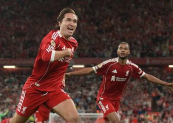 Pemain Liverpool, Federico Chiesa, merayakan gol ketiga timnya dalam laga Premier League melawan Bournemouth, Sabtu, 16 Agustus 2025. (c) AP Photo/Ian Hodgson