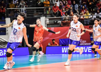 Para pemain timnas voli Vietnam berselebrasi.(Volleyball World)