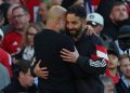 Manajer Manchester City asal Spanyol Pep Guardiola (kiri) dan pelatih kepala Manchester United asal Portugal Ruben Amorim (kanan). (AFP/DARREN STAPLES)
