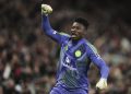 Selebrasi Andre Onana pada laga MU vs Lyon di Liga Europa musim 2024/2025 (c) AP Photo/Jon Super