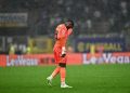 AC Milan tengah berada dalam mode siaga karena salah satu rivalnya di Liga Italia tertarik memboyong Mike Maignan. (GABRIEL BOUYS/AFP)