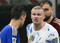 Erling Haaland buka suara soal keributan panas dengan Gianluca Mancini di laga Italia vs Norwegia. Bomber Manchester City itu mengungkap alasan sebenarnya ia sampai ditahan Gianluigi Donnarumma. (Getty Images)