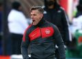 Pelatih timnas Kanada, John Herdman, memberikan instruksi dari pinggir lapangan dalam laga melawan Amerika Serikat pada Kualifikasi Piala Dunia Zona CONCACAF yang digelar di Stadion Tim Hortons Field, Ontario, pada 30 Januari 2022.(Getty Images via AFP/VAUGHN RIDLEY)