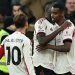 Alexander Isak (kanan) merayakan gol dengan rekan satu timnya dalam pertandingan sepak bola Liga Inggris antara West Ham United vs Liverpool di Stadion London, di London pada 30 November 2025. (Photo by Ben STANSALL / AFP)(AFP/BEN STANSALL)