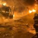 Foto: Api dan asap mengepul dari truk yang terbakar di lokasi fasilitas gudang yang terkena serangan pesawat tak berawak Rusia, di tengah serangan Rusia terhadap Ukraina, di desa Murovane, di luar Lviv, Ukraina, 6 September 2024. (via REUTERS/STATE EMERGENCY SERVICE OF UKRAI)
