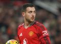 Diogo Dalot dalam laga Liga Inggris antara Manchester United vs West Ham, Jumat (5/12/2025). (c) AP Photo/Ian Hogdson