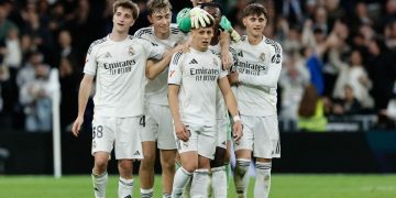 Gelandang Real Madrid asal Turkiye, Arda Guler, merayakan gol keempat timnya pada laga Liga Spanyol antara Real Madrid CF dan Elche CF di Stadion Santiago Bernabeu di Madrid pada 14 Maret 2026.(AFP/OSCAR DEL POZO)