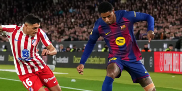 Troy Deeney memuji kebangkitan Marcus Rashford di Barcelona. Menurutnya, lingkungan tanpa ego di Catalan berhasil mengembalikan fokus Rashford hingga mencetak 10 gol. (Getty Images Sport)