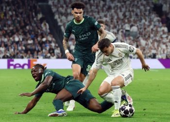 Manchester City kalah 0-3 dari tuan rumah Real Madrid di leg pertama babak 16 besar Liga Champions, Kamis (12/3) dini hari WIB (AFP/PIERRE-PHILIPPE MARCOU)