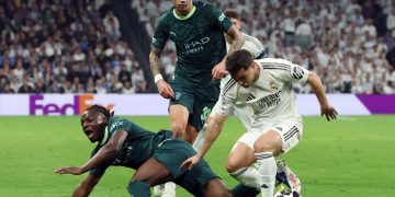 Manchester City kalah 0-3 dari tuan rumah Real Madrid di leg pertama babak 16 besar Liga Champions, Kamis (12/3) dini hari WIB (AFP/PIERRE-PHILIPPE MARCOU)
