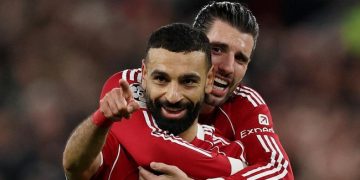 Selebrasi Mohamed Salah usai cetak gol untuk Liverpool. (REUTERS/Phil Noble)